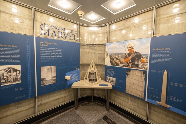 An exhibit entitled "An engineering marvel" has three tactile elements for visitors to touch: a miniature version of the Monument's exterior, a miniature version of the Monument's interior top two floors, and a piece of Monument's marble material.