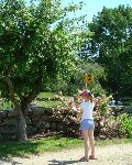 A Young Girl Sketching the Crabapple Trees