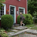 A visitor enters the Visitor Center