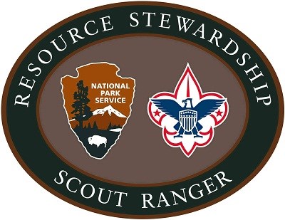 Image of Boy Scout patch for resource stewardship; green and gray oval with seals.