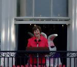 First Lady Laura Bush welcoming all egg rollers