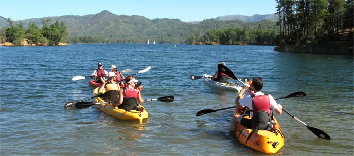 Visitors kayaking on a ranger-led tour on Whiskeytown Lake.