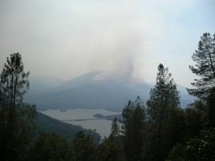 Smoke billowing from fires burning on Shasta Bally in Whiskeytown National Recreation Area