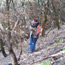 NPS Technician measuring slope steepness in burned area
