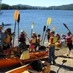 Image of Junior Rangers gearing up for a kayaking adventure on Whiskeytown Lake