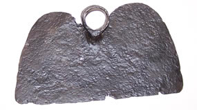 Hoe blade, badly pitted.