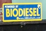 Bumper sticker on utility cart. The sticker says: