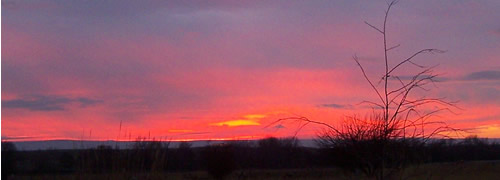 sunset turns clouds fiery red