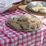 plate of biscuits on checkered table cloth