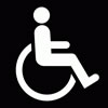 symbol of accessibility: stylized person sitting in wheelchair
