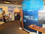 Here you can see a visitor interacting with the touchscreen display, that shows various slideshows and other media.