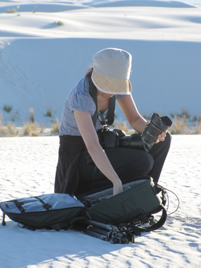 A photographer in the dunes