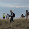 visitors enjoying a Lake Lucero tour