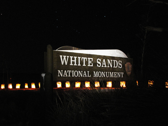 White Sands' entrance sign at night