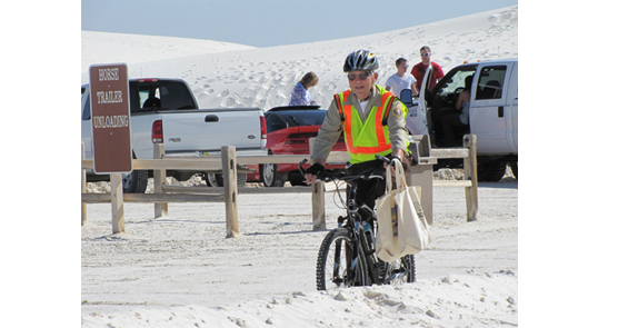 Monument volunteer conducting visitor contacts during Easter.