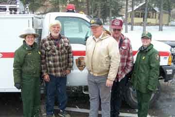 Superintendent Linda Stoll (far left) and Supervisory Forestry Technician Sabrina Henry (far right) with members of local volunteer fire departments.