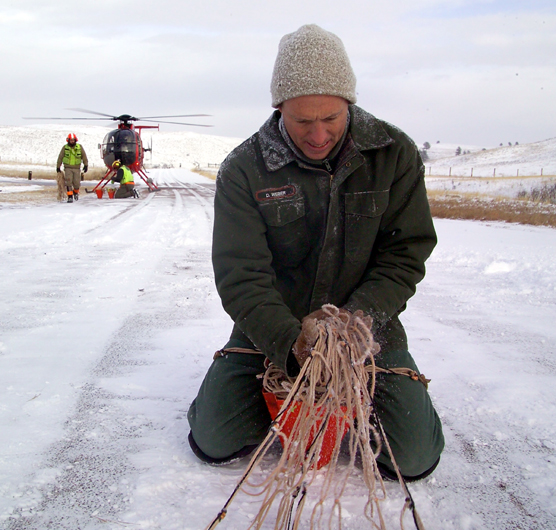 Biological Science Technician Duane Weber repackages a net used in Wind Cave National Park’s elk capture operation.