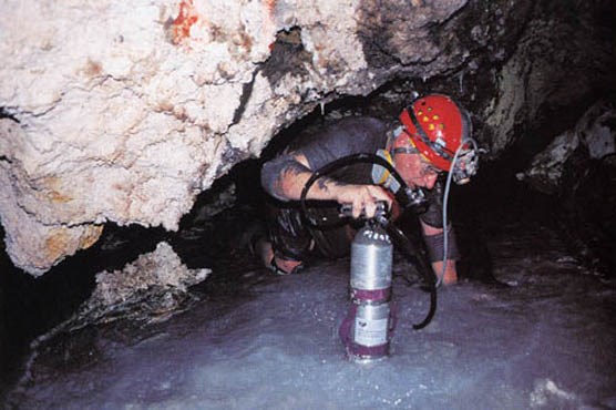 Jim Pisarowicz using oxygen to explore Cave of the Lighted House.