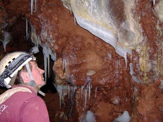 Physical Science Technician Marc Ohms examines a new discovery his team named “Stalactites Galore”.