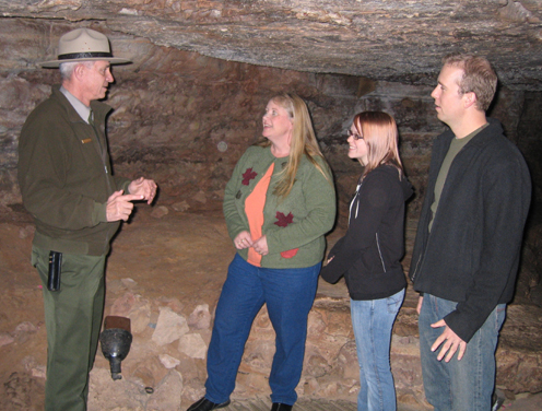 Ranger Jack Howell talking with visitors in the Assemble Room in Wind Cave.