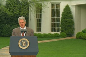 President Clinton speaks outside the White House.