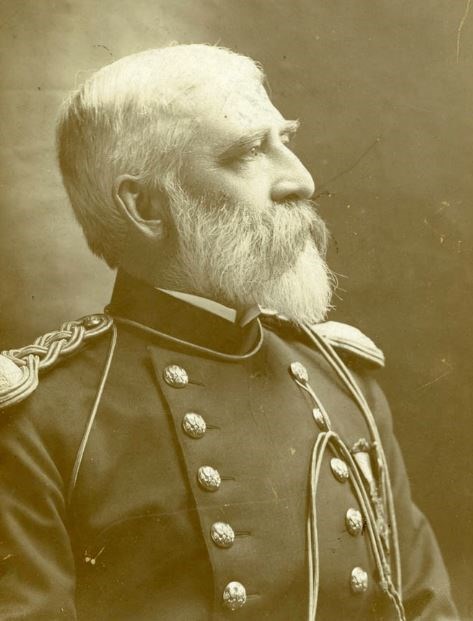 A distinguished white-haired man poses for a portrait in Union uniform