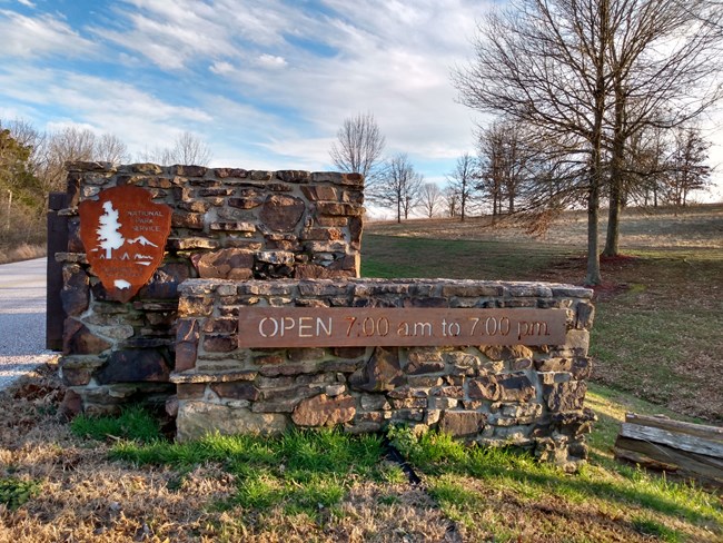 Stone gate with sign at entrance of Wilson's Creek National Battlefield