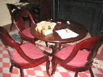 M'Clintock House Parlor with table and fireplace