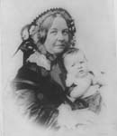 Elizabeth Cady Stanton holding her daughter Harriot in 1856.