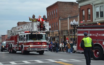 Santa Claus joins the Seneca Falls Fire Department in the parade.