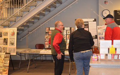 Seneca County Historian Walter Gable (left) shares his exhibit.