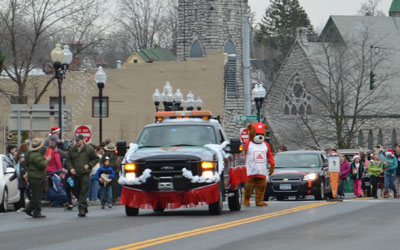 NPS truck and rangers in the parade.