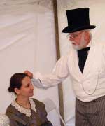 Paul Kuhn performs a phrenological exam.