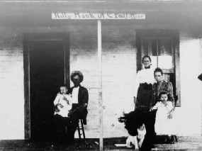 The Tate family in front of the Kitty Hawk Post Office.