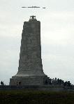 Spirit of Kitty Hawk over the monument