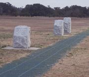 An image of the flightline showing granite markers where the first flights landed.