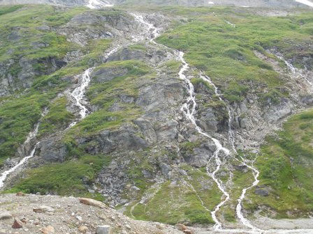 Waterfalls along glacier Waterfalls along glacier