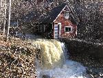 Assay building damaged by flooding National Creek