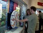 Visitors at interactive exhibit