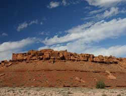 A red rock mesa against blue sky