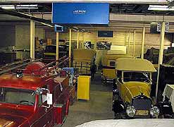 (Bldg 2009) This image depicts a portion of the historic vehicles currently in storage. Some of the vehicles have had their dust covers temporarily removed to illustrate the different models represented in the collection.
