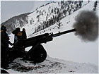 Park staff use a howitzer to reduce avalanche danger.