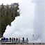A crowd watches as Giant Geyser erupts.
