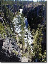 The water of Kepler Cascades tumbles 125 feet.