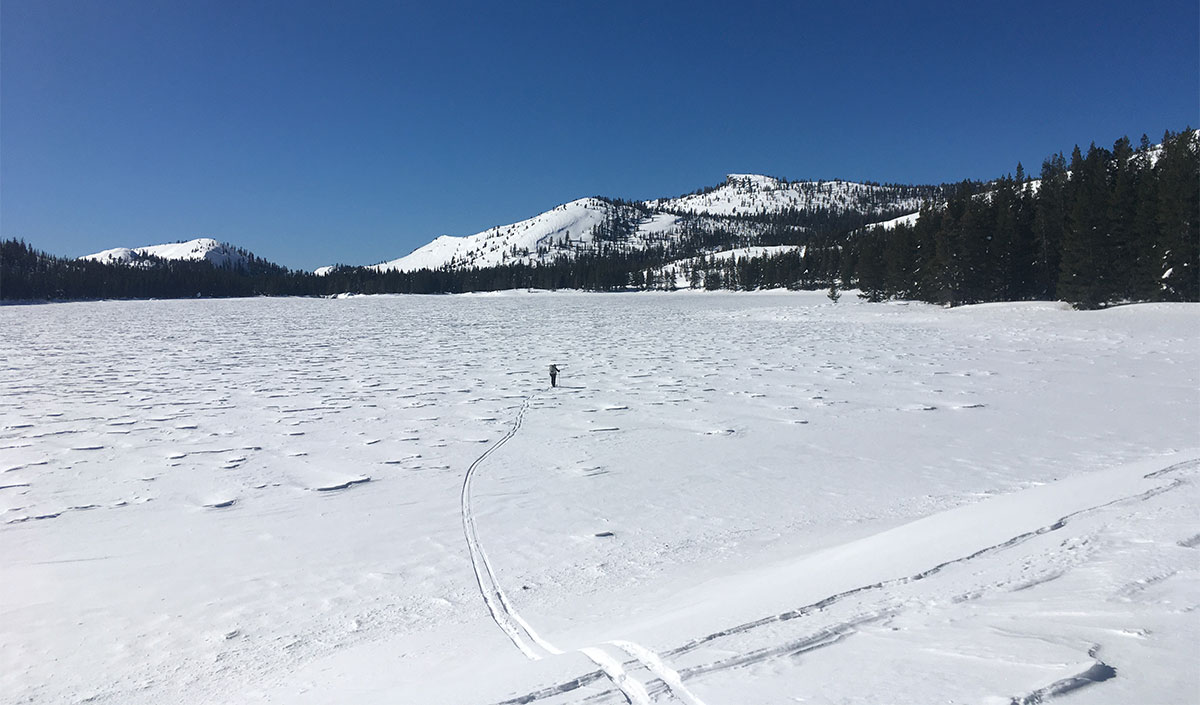 Skiing across Tenaya Lake on January 25, 2023.