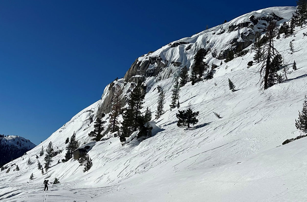 Skier looking at Spring Hill above the Tioga Road on January 24, 2023.