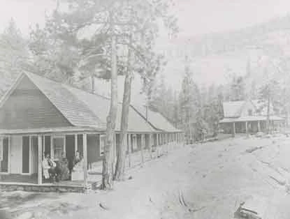 Two historic buildings nestled in the woods