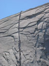 Cables ascend the east side of Half Dome