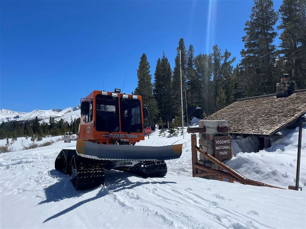 Snowcat at Tioga Pass Entrance on top of several feet of snow