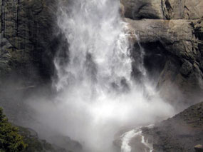 Upper Yosemite Falls crashes to its base, sending spray out in all directions